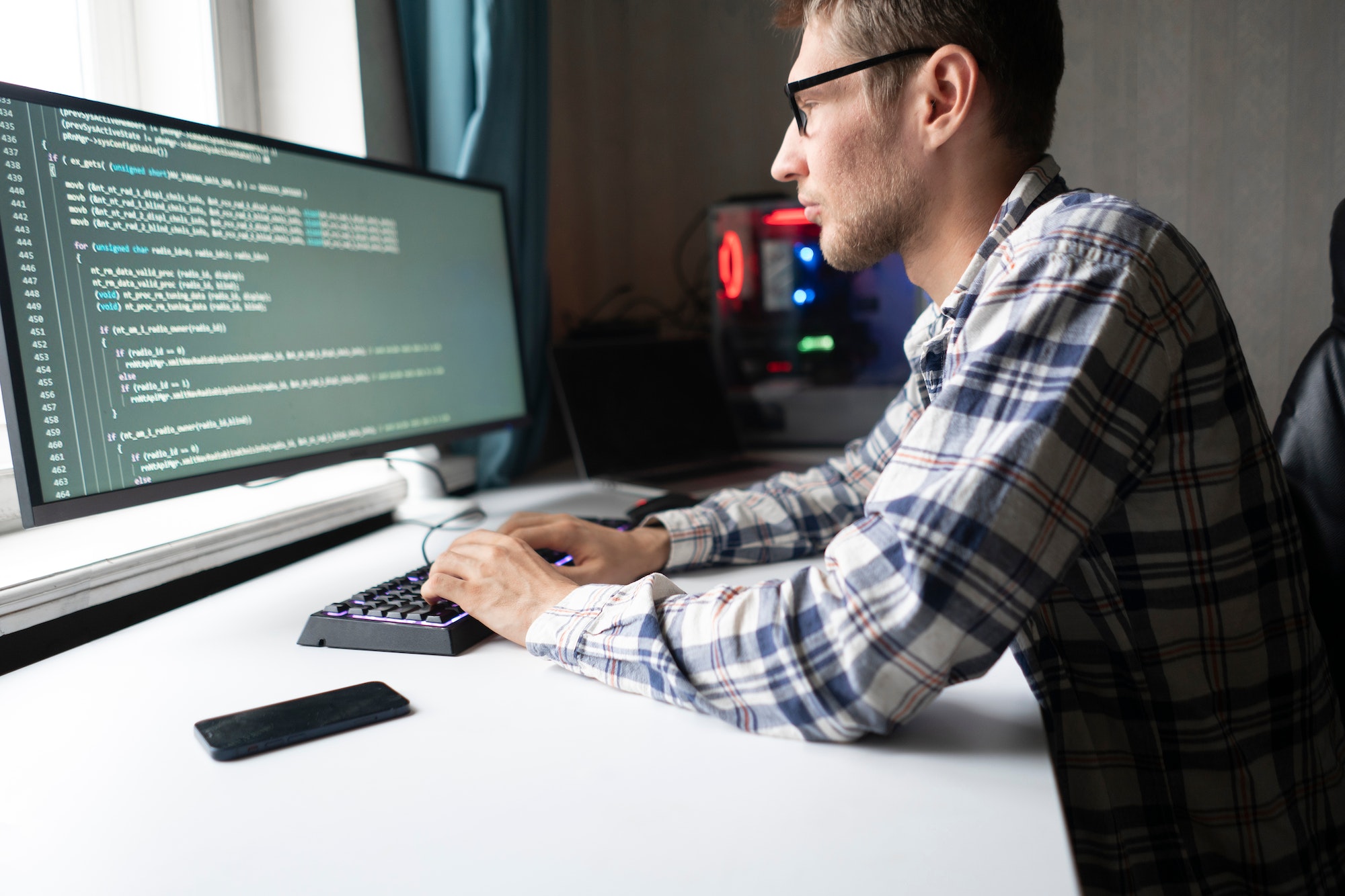 a programmer developer making new code script working on cybersecurity application